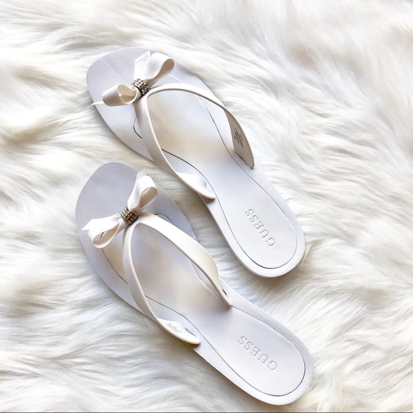 guess white flip flops